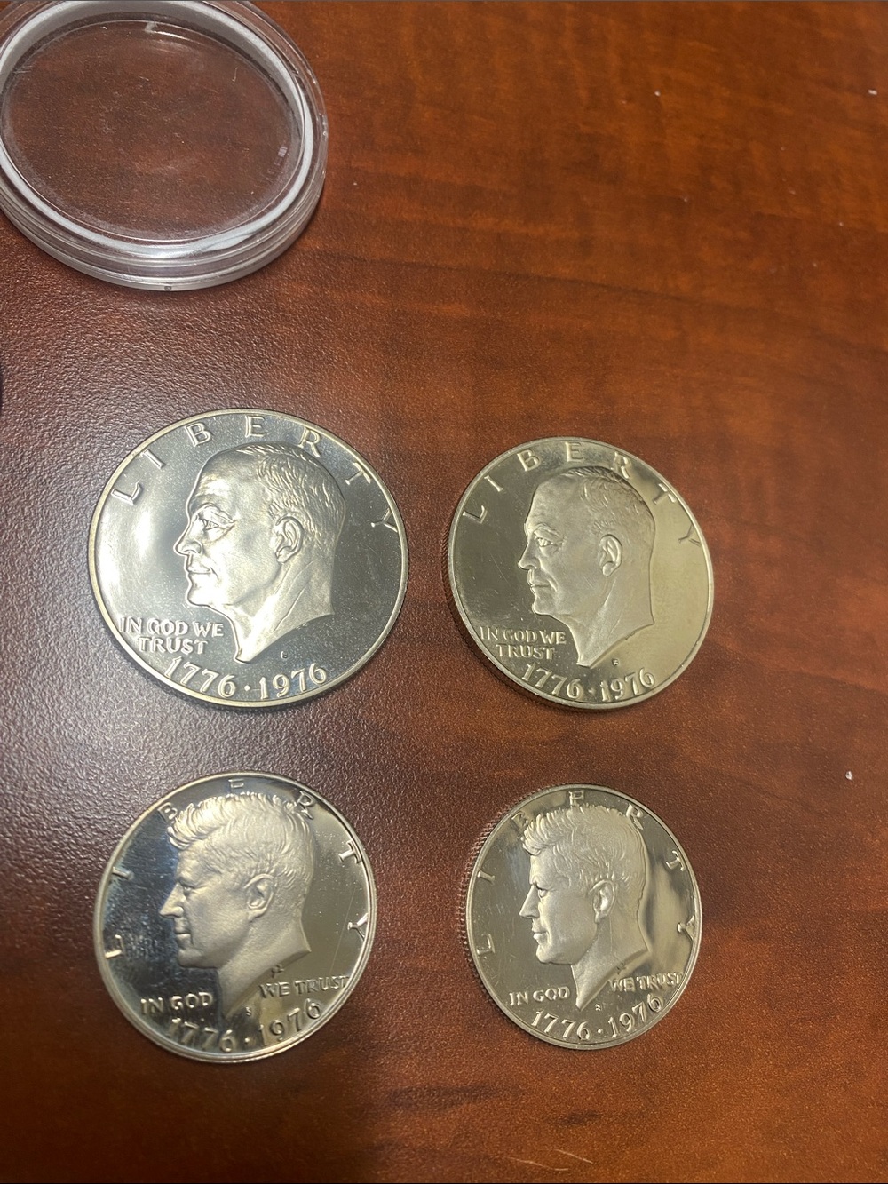 1776- 1976 JFK Half Dollar and Eisenhower Dollar uncirculated coins (D)
